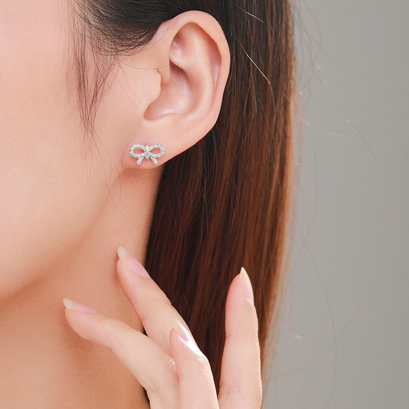 עגילי פפיון צמודים כסף 925 משובץ אבני זירקוניה